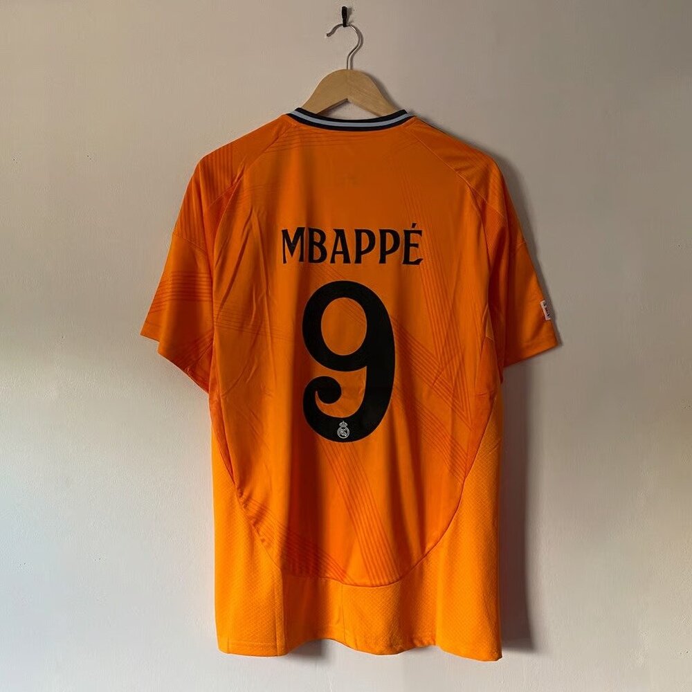 mbappe Real Madrid orange jersey
